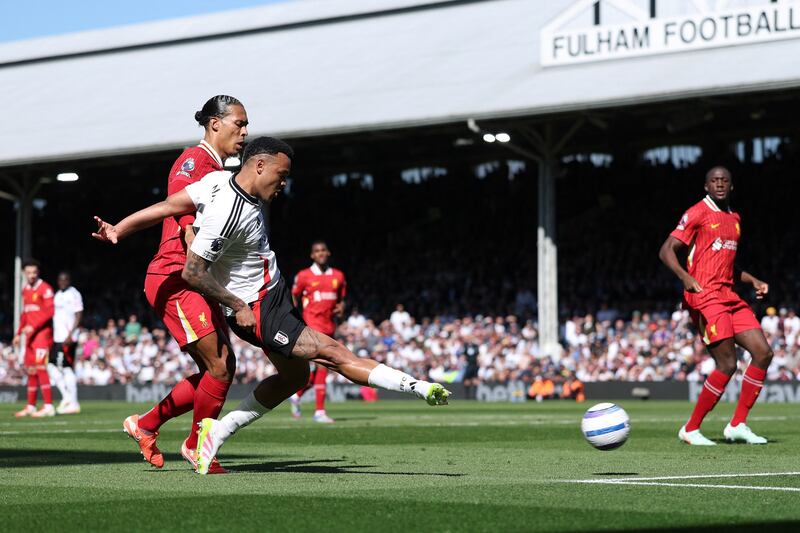 Rodrigo Muniz scores Fulham's third goal in their win over Liverpool on Sunday. Picture: REUTERS