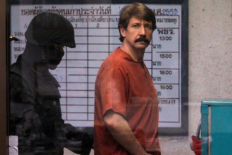 Alleged arms smuggler Viktor Bout from Russia is escorted by a member of the special police unit as he arrives at a criminal court in Bangkok, Thailand in this October 4 2010 file photo. Picture: REUTERS/DAMIR SAGOLJ